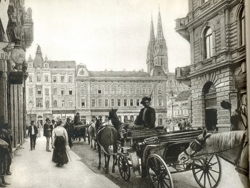 Ulica Marije Valerije (današnja Praška) 1910. godine. Pogled na kuću Baumgärtner i kuću Kolmar